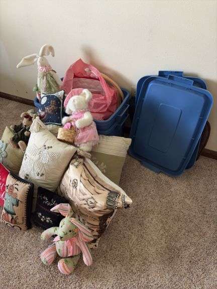 Pillows, stuffed rabbits and two totes to haul them home in