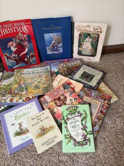 Children’s books and a basket of stuffies
