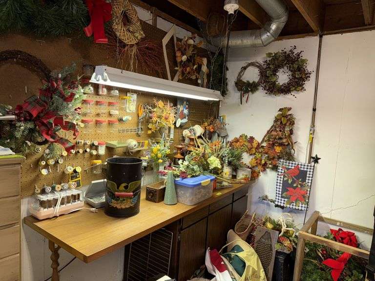 All decor items in corner and on bench and wall image