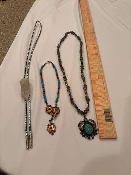 Three Necklaces, Bolo tie image