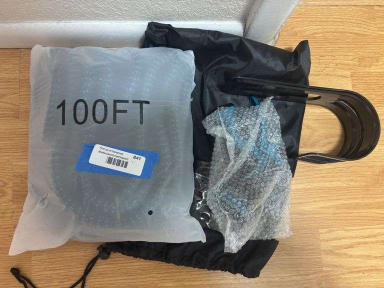 100 foot expandable hose with nozzle and wall holder image