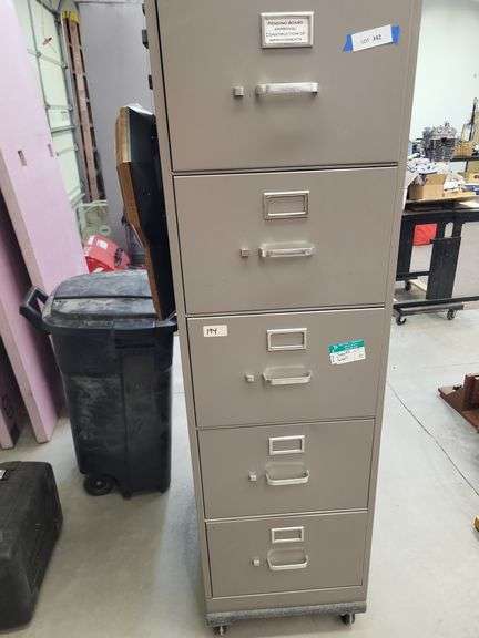 File cabinet 18x28x61 on wheels with clock on side image