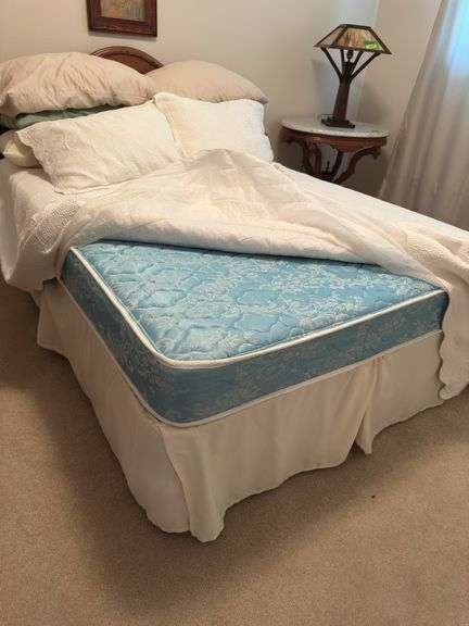 Full size bed with walnut headboard, mattress and box spring LINENS INCLUDED