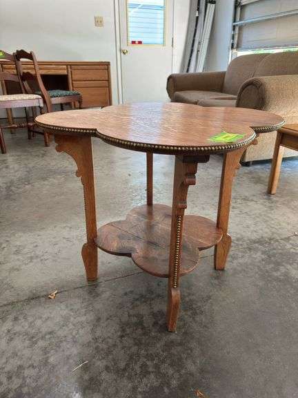 Clover shaped oak table w/ brass beaded edge