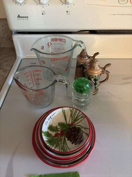 Two glass measuring cups, wine stopper, holiday measuring bowls, pair of stein style S&P shakers image
