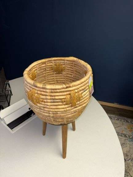 Basket style planter on wooden legs, handmade in Vietnam Approx 22” tall