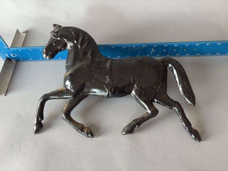 Metal horse from weather vane, BB holes patched 😉 image