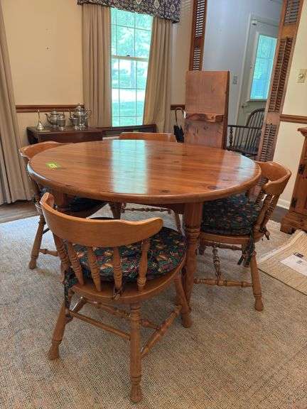 48" round dining table with 4 chairs and (2) 12” leaves image