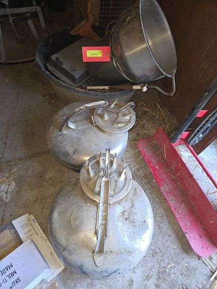 Stainless steel milk pails and 2 surge milkers image