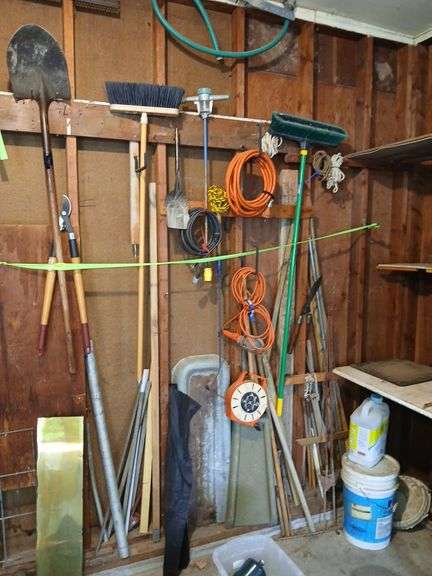 Yard tools, electric fence posts, brooms, drop cords etc image