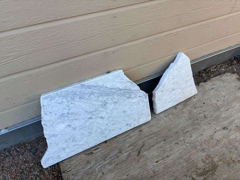 Two broken granite/stone pieces image