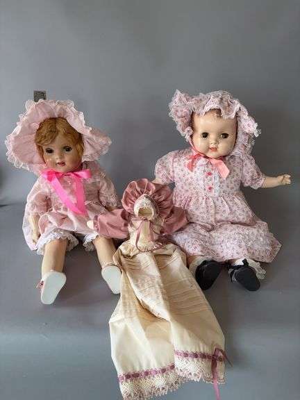 Two large composition dolls with moveable eyes One needs her head reattached Approx 2’ tall image