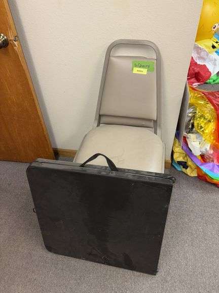 Two chairs and a 4’ fold in half table image