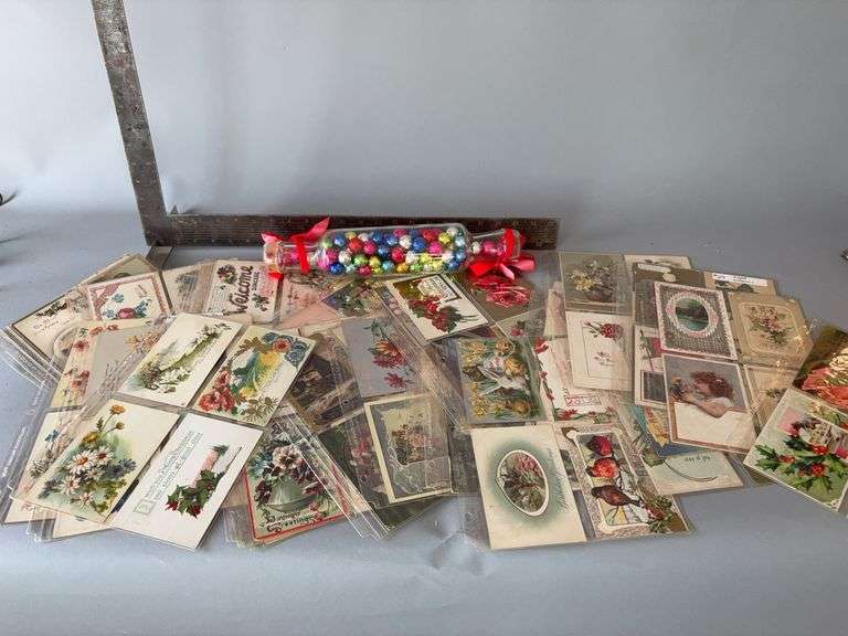 Clear glass rolling pin filled w mini bulbs, vintage postcards (most floral), 33 pages image