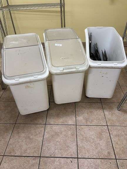 Three plastic storage bins, one missing lid, all roll (sorry you will have to dump flour), stainless covers to serving dishes image