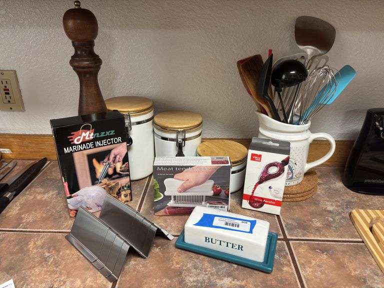 Canister set, kitchen utensils, marinade injector, meat tenderizer, wine aerator, butter dish, and taco stands image