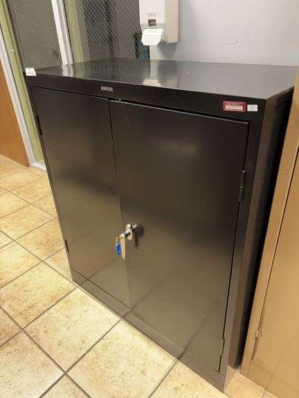 Black storage cabinet with key 36x18x42-can't get open needs a little work image