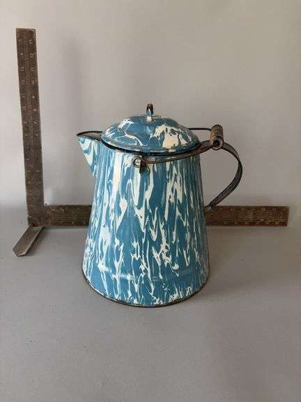 Blue swirl enamel cowboy coffee pot image