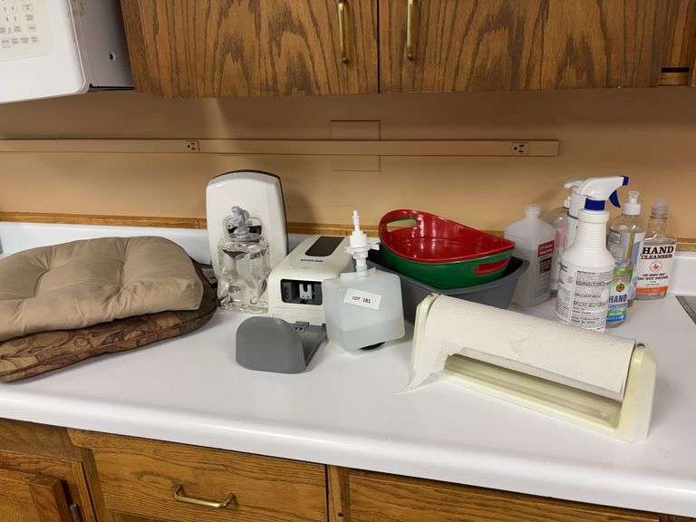Hand sanitizer machines, chair seat cushions, plastic small tubes, soaps-Bring box to pack image