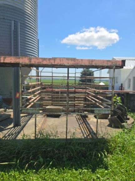 Steel tube slide in pickup stock rack and steel feed troughs image