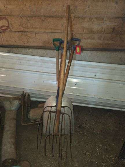 4 tine pitchfork, 2 shorthanded straw forks, and alum scoop shovel image