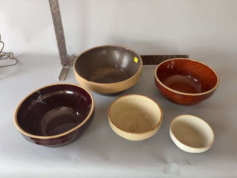 Five stoneware bowls-one marked on bottom USA 9in Bowls measure 6” - 11” image