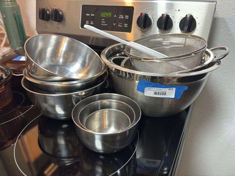 Assorted stainless steel bowls and colanders image