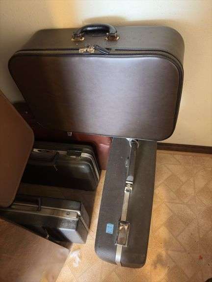 Many suitcases, great for using as props