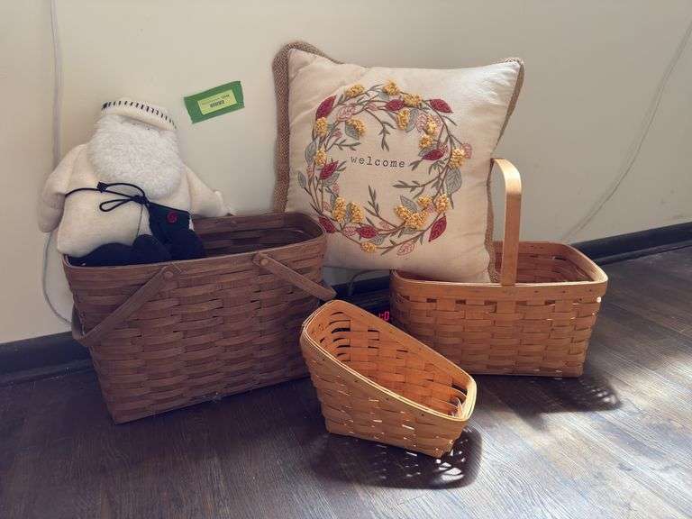 Three Longaberger baskets, Welcome pillow and Santa Claus image