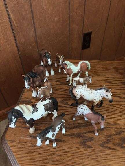 Resin horses, mares and foals, most appear to be Schleich image