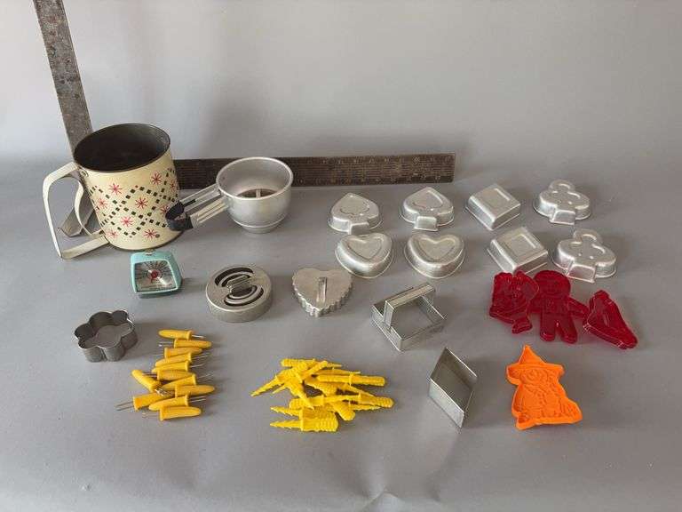Collection of vintage kitchen items-cookie cutters, fridge/freezer thermometer, corn holders, sifters, etc image