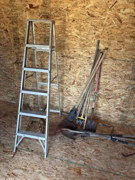 Aluminum step ladder and assorted hand tools, including ice tongs image