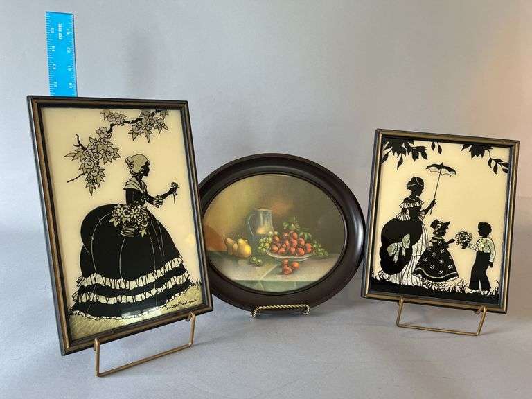 Vintage silhouettes and tin framed still life image