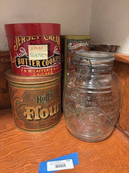 Three vintage tins and glass barrel jar image