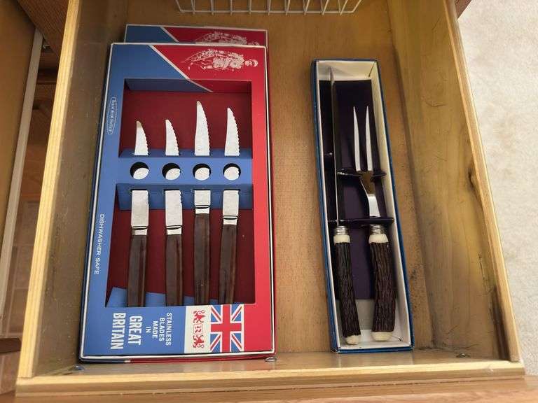 4 kitchen drawers marked "A" with flatware and kitchen utensils