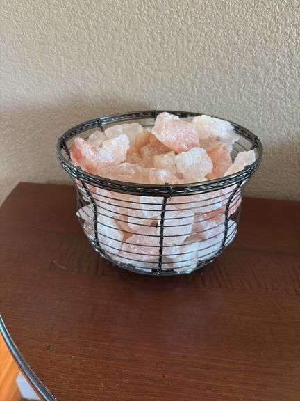 Metal basket with lighted salt rocks