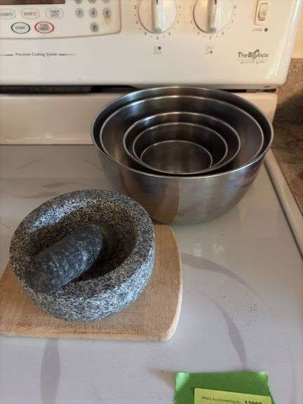 Stainless steel mixing bowls, mortar & pestle, cheese cutting board image
