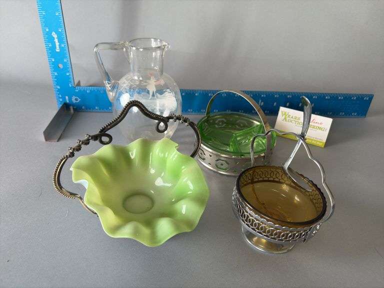 Four dishes includes mini brides basket, amber jelly dish, green depression divided dish and clear pitcher image