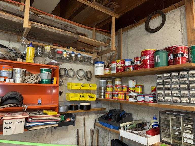 Assortment bins, hose clamps, cans of nails etc in corner above marker tape image