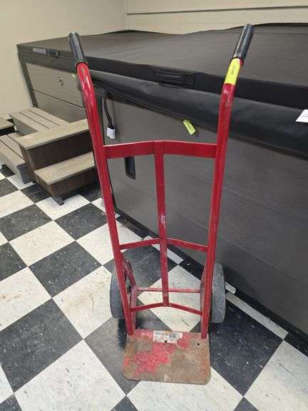 Red 2 wheeled, 2 handled hand truck image