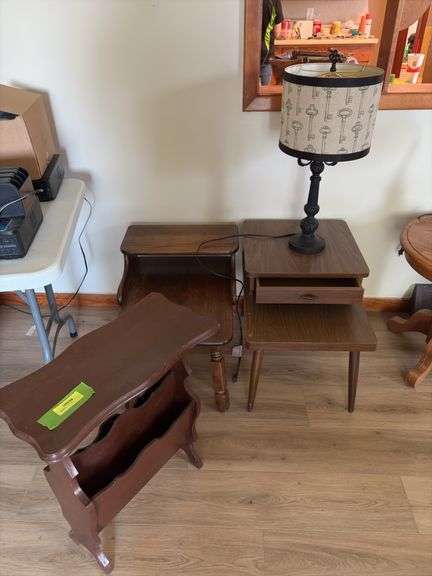 Three end tables and a table lamp image