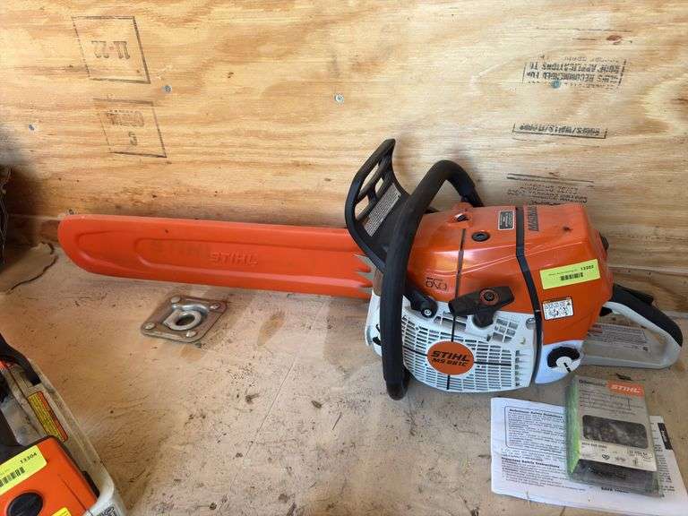 Stihl MS661C chainsaw and extra chain image