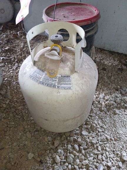 Near full gas grill lp cylinder image