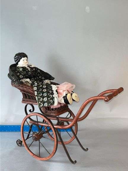 Reproduction doll stroller and Minerva head doll w/ china hands image