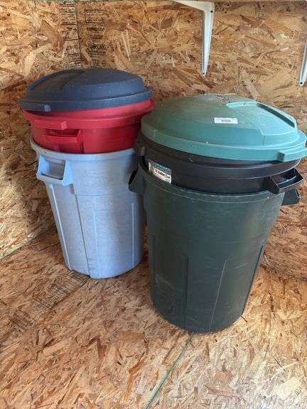 Four trash cans, all with lids image
