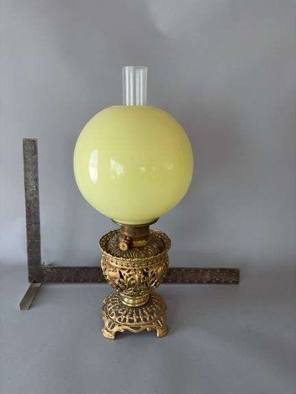 Approx 24” Gone with the Wind style lamp with brass base and pale yellow globe image