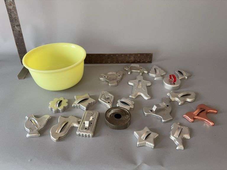 Pale yellow Hamilton Beach mixing bowl with vintage cookie cutters image