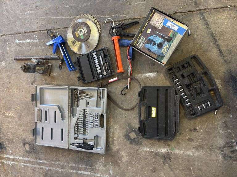 Drill doctor, caulk guns, bottle jack, saw blades, socket set image