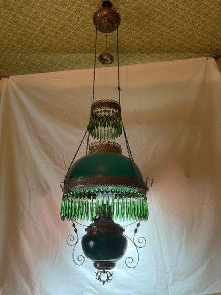 Prism ring hanging light,  w/ deep green shade, 58 green prisms on shade ring, 22 green prisms on upper ring, top shade ring does not match other 3 rings, metal font, ceiling reel Original NOT electrified image