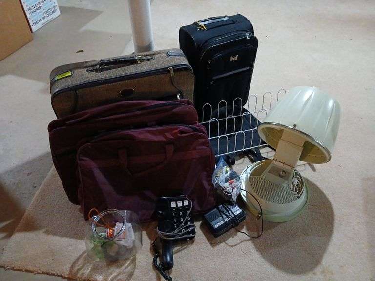 Luggage, retro hairdryer, landline phone, fish bowl, shoe rack, etc